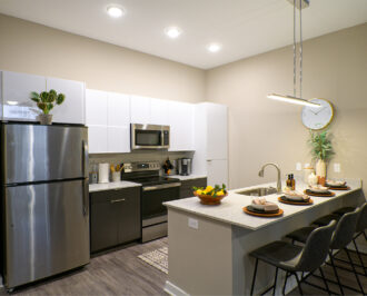 Furnished kitchen with stainless steel appliances