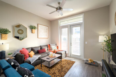 Furnished living space with bright colored decor