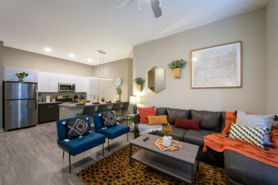 Furnished living space with bright colored decor