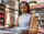 Young woman shopping for records